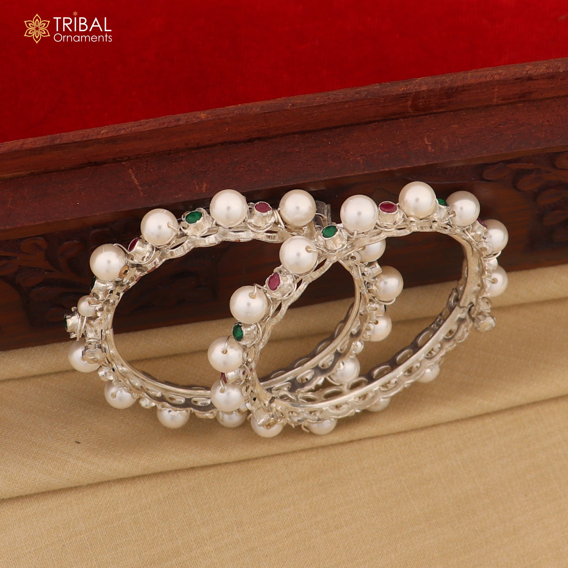 Sterling silver tribal bangle with pearl beads and intricate designs, customized for cultural and traditional jewelry style.