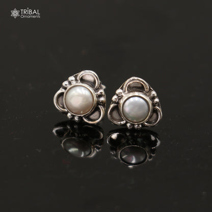 925 sterling silver pearl stone stud earring by TRIBAL ORNAMENTS, unisex jewelry featuring a shiny pearl and silver setting.