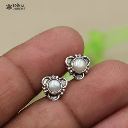 Sterling silver pearl stud earring by TRIBAL ORNAMENTS, unisex jewelry with a lustrous pearl stone, elegant and versatile accessory.