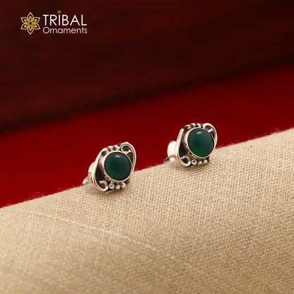 Sterling silver round green onyx stud earring by TRIBAL ORNAMENTS, unisex jewelry with polished gemstone and sleek design
