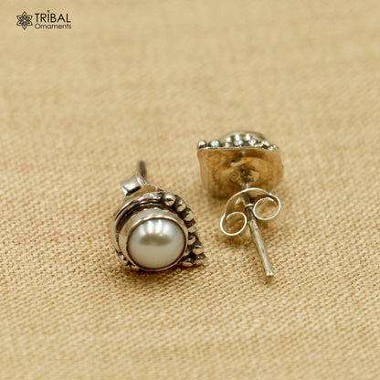 Sterling silver round pearl stud earring by Tribal Ornaments, elegant unisex jewelry with a polished finish and classic design.