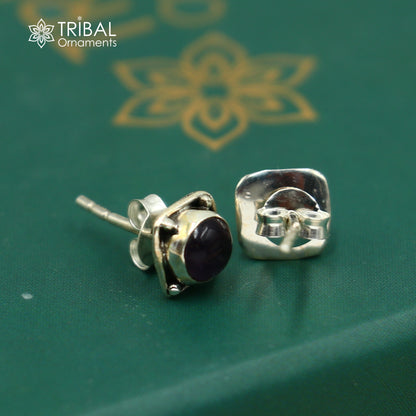 Sterling silver square-shaped amethyst stud earring by TRIBAL ORNAMENTS, unisex jewelry with vibrant purple gemstone.