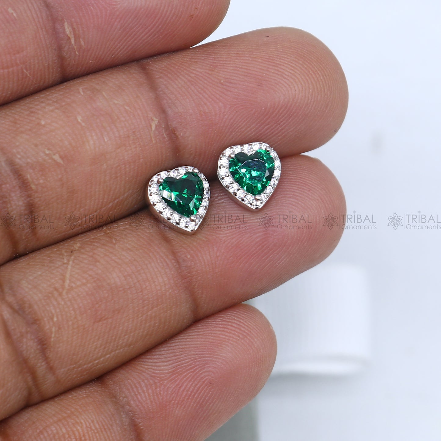 925 Sterling silver heart-shaped pendant set with green diamond (emerald) accents, crafted by TRIBAL ORNAMENTS.