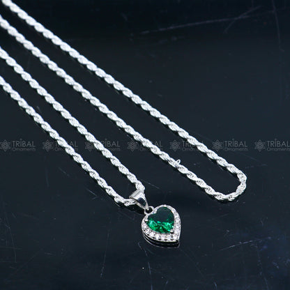 925 Sterling silver heart-shaped pendant set with green diamond (emerald), featuring a tribal ornament design.