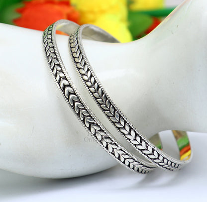 Sterling silver handcrafted floral design bangles bracelet by TRIBAL ORNAMENTS, featuring stylish tribal belly dance jewelry.