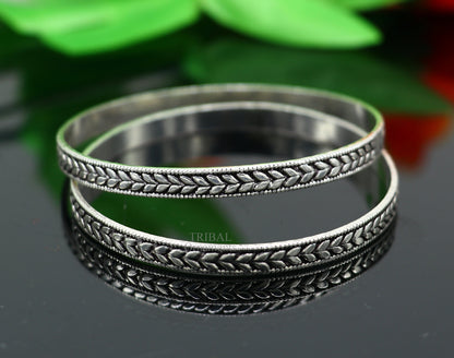Sterling silver handcrafted floral design bangles bracelet by TRIBAL ORNAMENTS, stylish tribal belly dance jewelry with intricate floral patterns