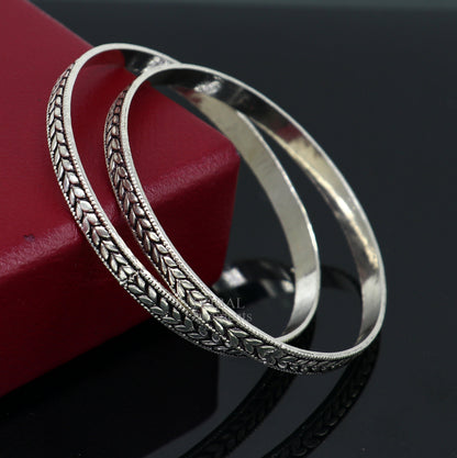 Sterling silver handcrafted floral design bangles bracelet by TRIBAL ORNAMENTS, featuring intricate tribal and belly dance jewelry style.