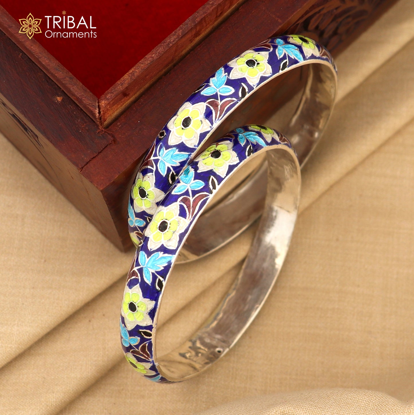 Sterling silver handcrafted bangles with colorful enamel flower design from Tribal Ornaments, vintage style jewelry for the wrist.