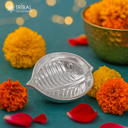 Handcrafted 925 sterling silver tilak and sindur bowls with intricate tribal design, used for puja and home temple rituals.