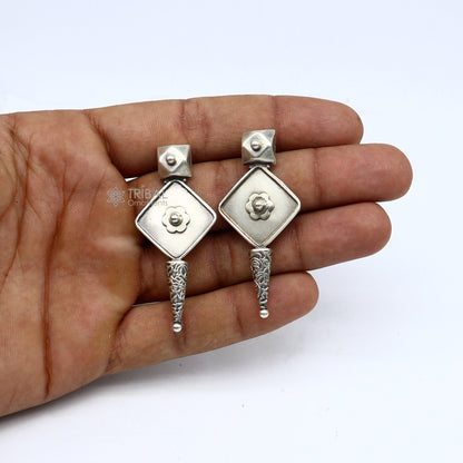 Sterling silver handcrafted stud earring with stylish design, perfect for party wear, gifting, or wedding jewelry by TRIBAL ORNAMENTS.