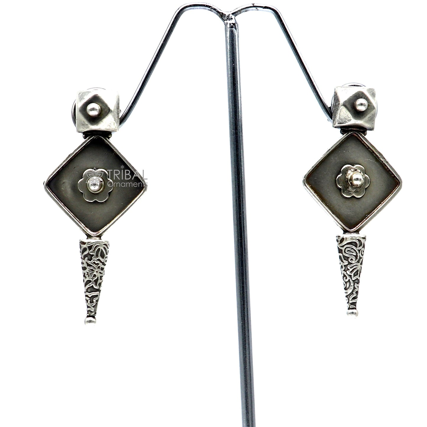 Sterling silver handcrafted tribal earrings with stylish design, perfect for party wear, gifting, and special occasions.