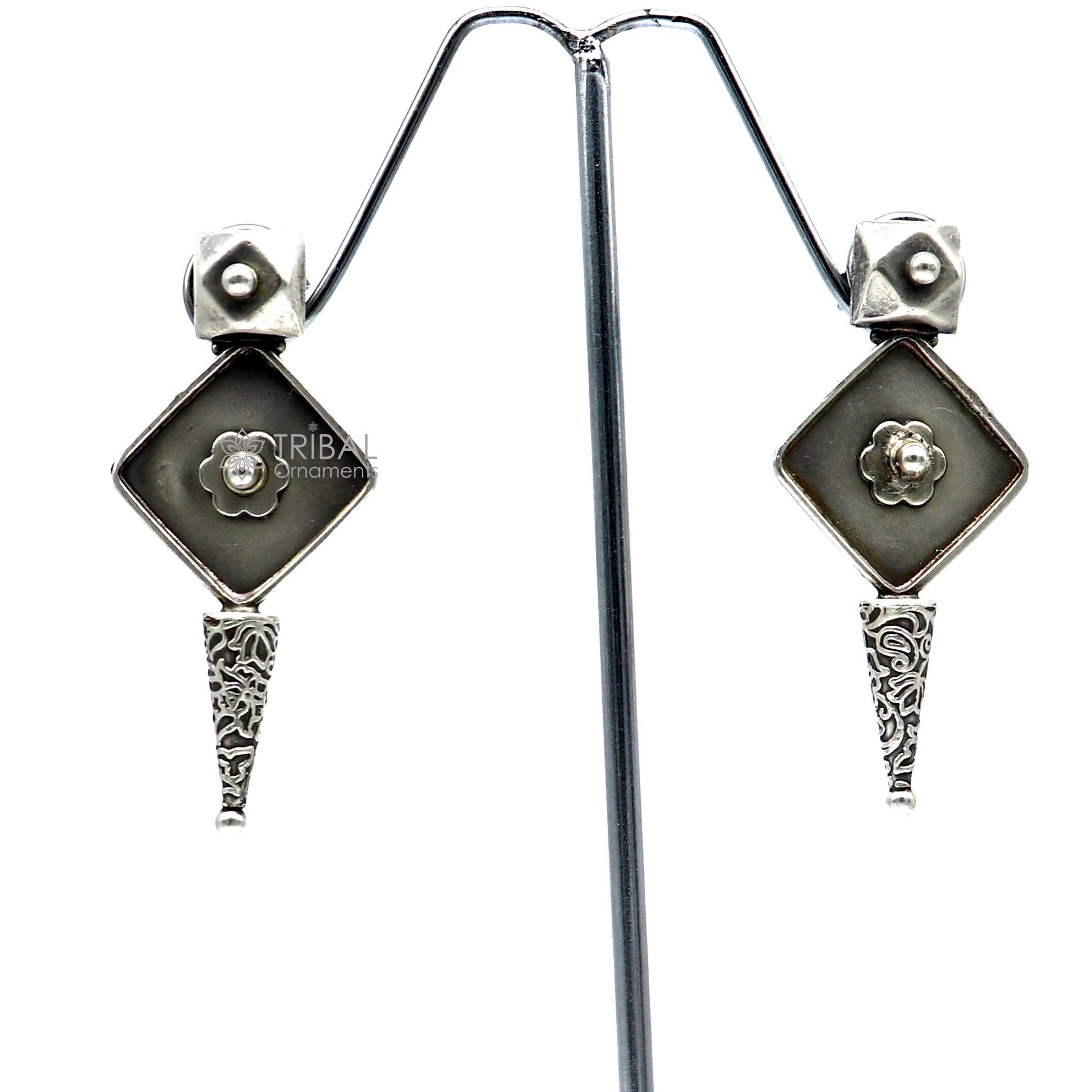 Sterling silver handcrafted tribal earrings with stylish design, perfect for party wear, gifting, and special occasions.