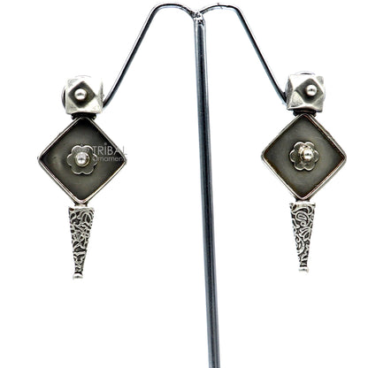 Sterling silver handcrafted tribal earrings with stylish design, perfect for party wear, gifting, and special occasions.