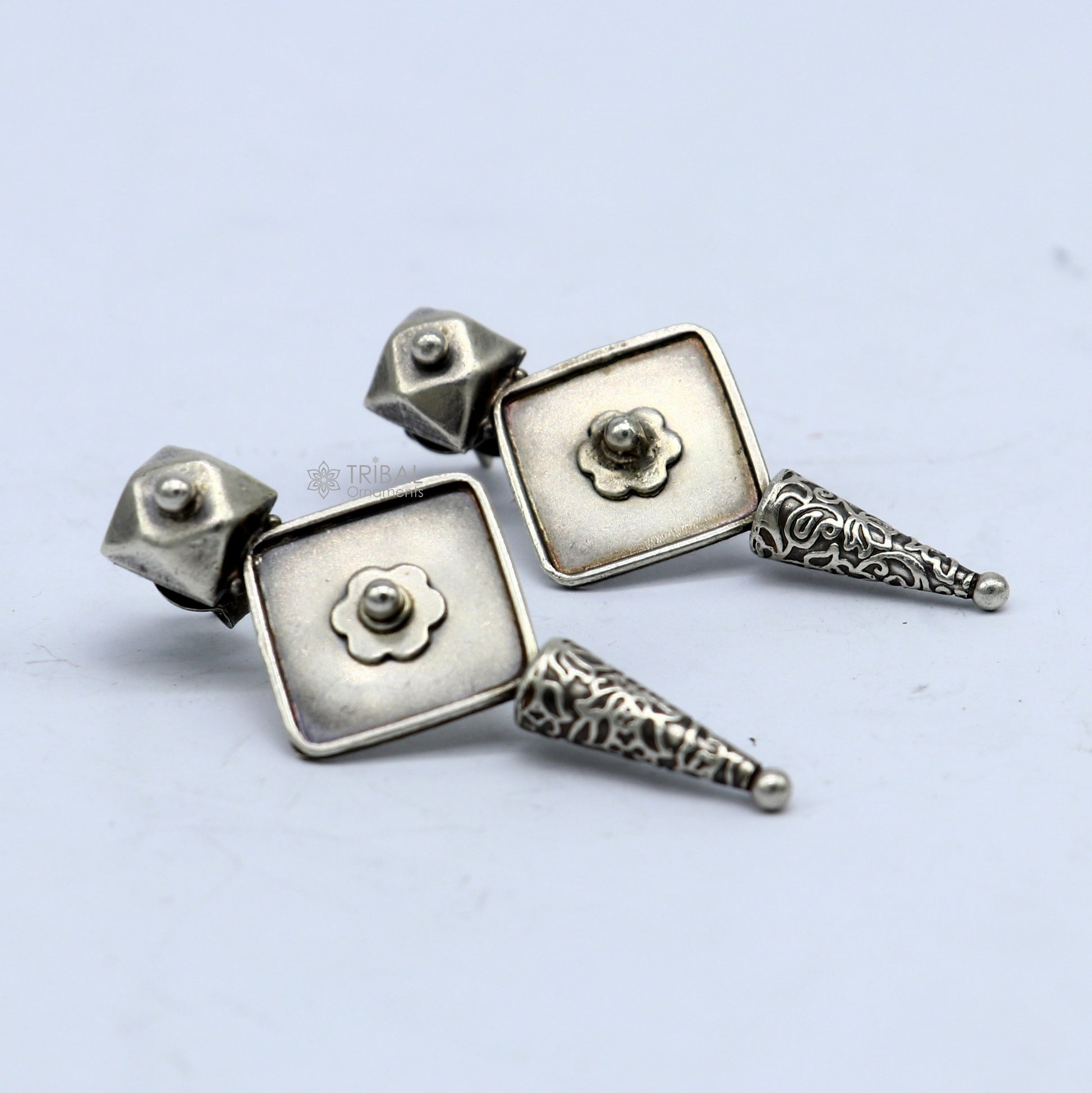 Sterling silver handcrafted stud earring with stylish tribal design, perfect for party wear, gifting, or wedding jewelry.