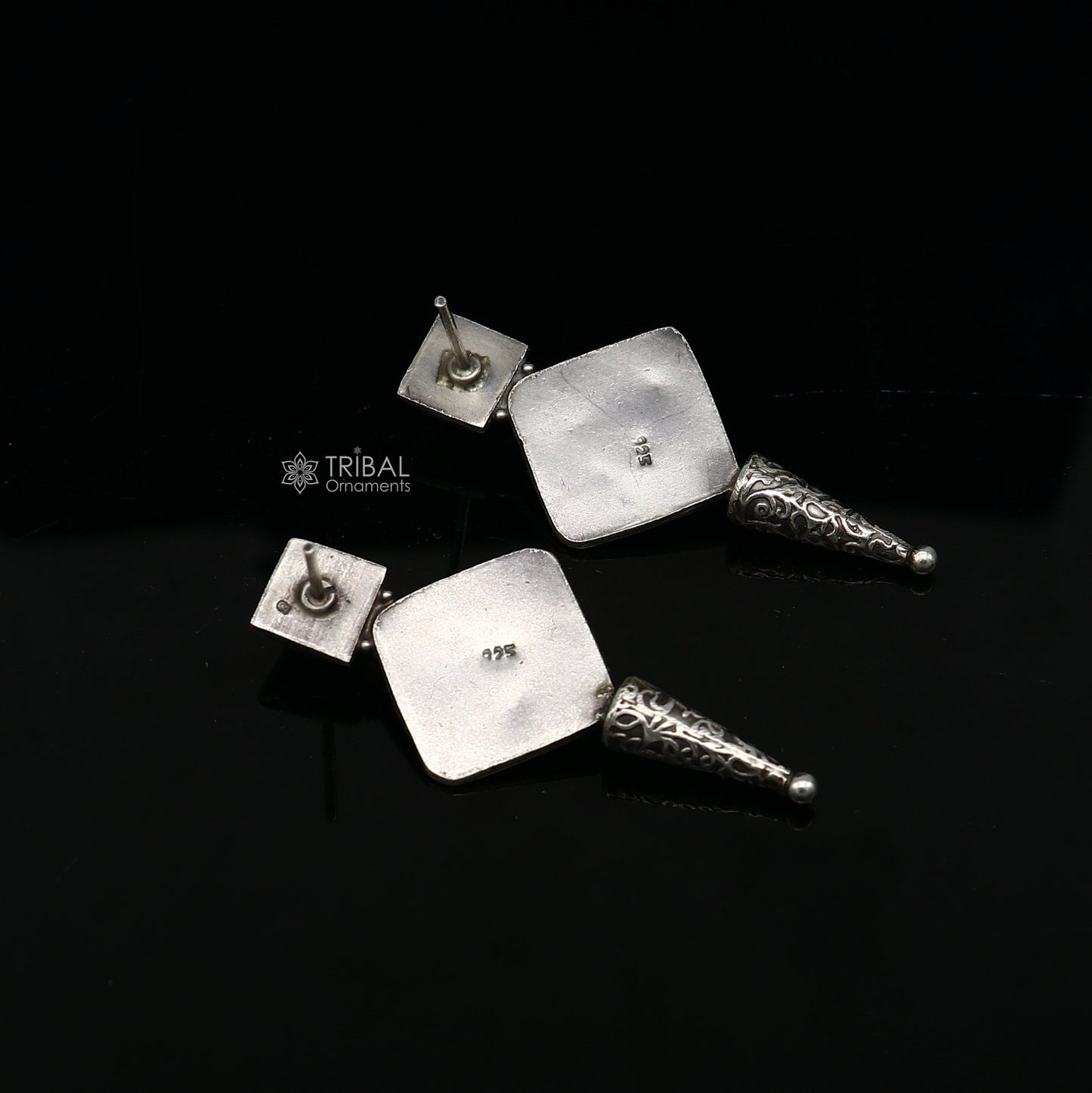 Sterling silver handcrafted stud earrings with stylish design, perfect for party wear, gifting, and special occasions by TRIBAL ORNAMENTS.