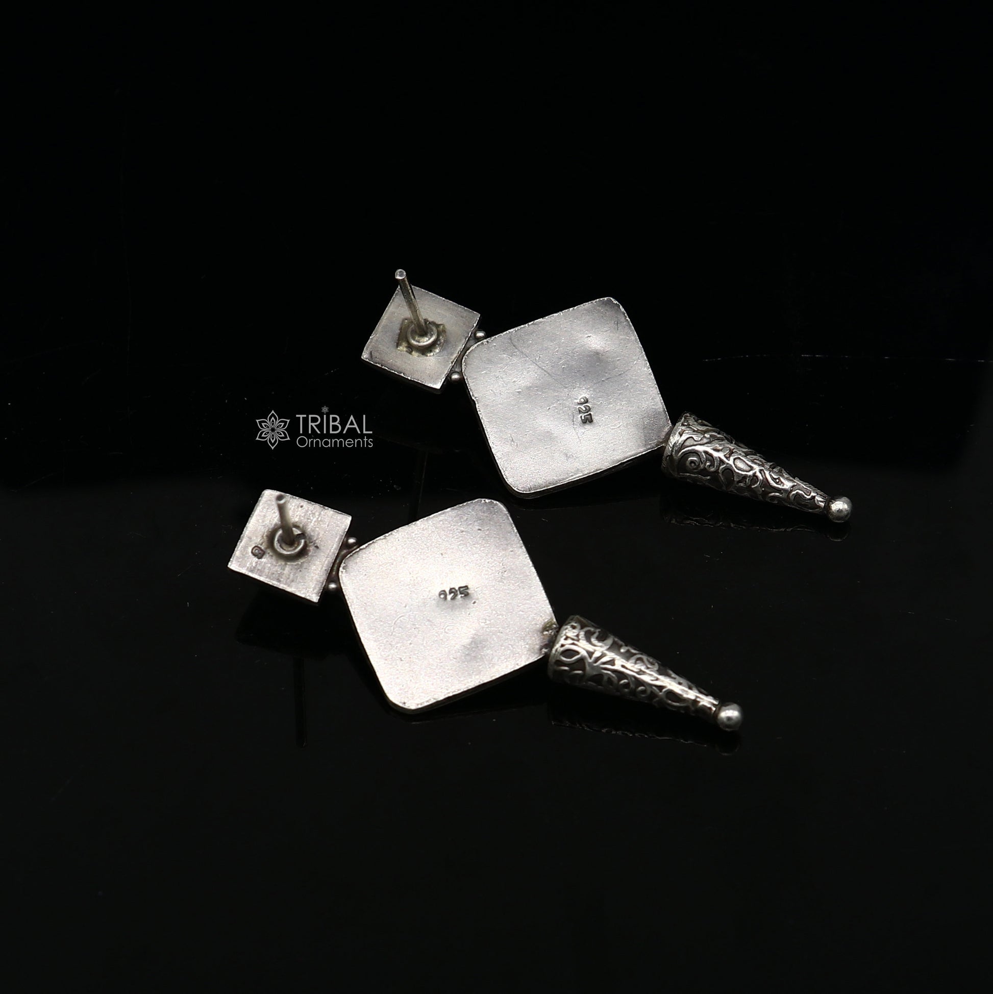 Sterling silver handcrafted stud earrings with stylish design, perfect for party wear, gifting, and special occasions by TRIBAL ORNAMENTS.