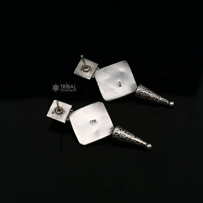 Sterling silver handcrafted stud earrings with stylish design, perfect for party wear, gifting, and special occasions by TRIBAL ORNAMENTS.