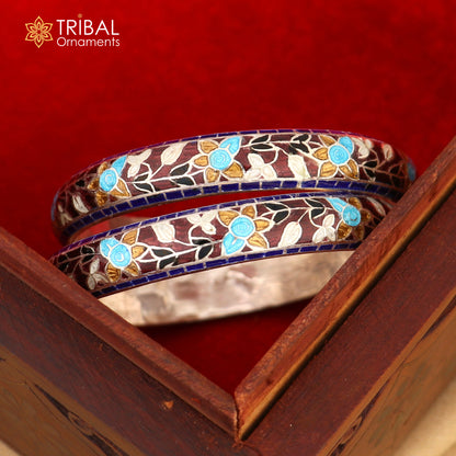 Sterling silver bangles with multicolor enamel flower design, handcrafted Tribal Ornaments bracelet featuring vibrant floral accents.
