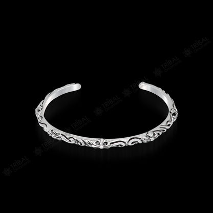 Sterling silver tribal bangle cuff for men and women featuring a handcrafted, glossy, solid design by Tribal Ornaments.