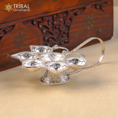 Handmade 925 Sterling silver Aarti lamp with intricate temple art design, perfect as a home decor or temple figurine by TRIBAL ORNAMENTS.