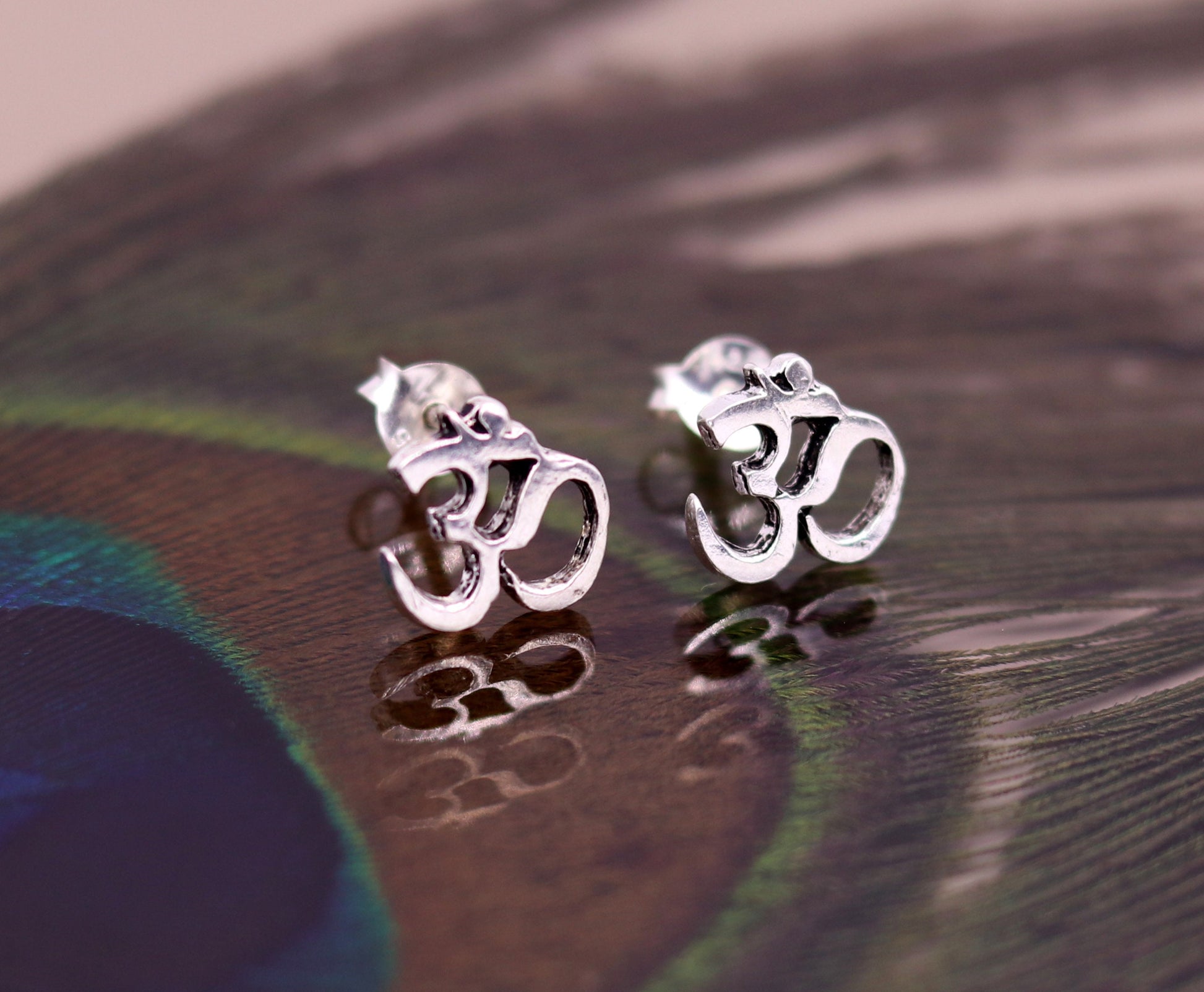 Sterling silver handmade Aum OM stud earring from Rajasthan, India, featuring unisex solid silver jewelry by TRIBAL ORNAMENTS.