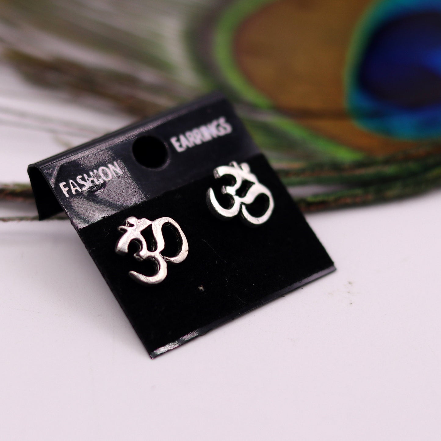 Unisex 925 sterling silver handmade Aum OM stud earring from Rajasthan, India, featuring traditional tribal jewelry design.