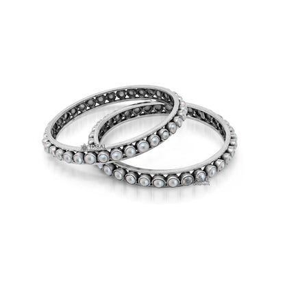 925 sterling silver bangle bracelet with a natural pearl, tribal oxidized jewelry design, handmade and custom-made by Tribal Ornaments
