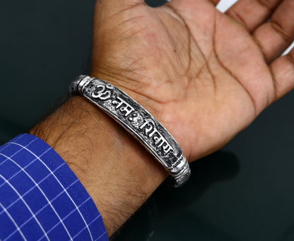 Sterling silver handmade Lord Shiva "Om Namah Shivay" mantra bracelet, unisex tribal ethnic jewelry with Chitai work design.
