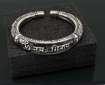 Sterling silver handmade Lord Shiva "Om Namah Shivay" mantra bracelet with tribal Chitai work, unisex ethnic jewelry.