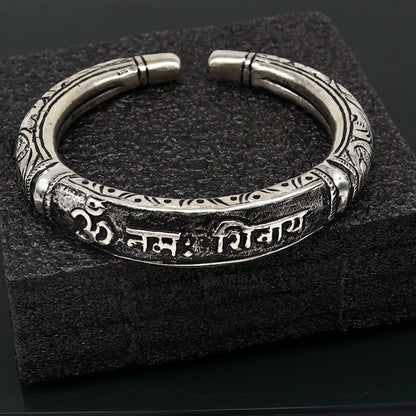 Sterling silver handmade Lord Shiva "Om Namah Shivay" mantra bracelet with Chitai work, unisex tribal ethnic jewelry.