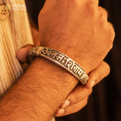Sterling silver handmade Lord Shiva "Om Namah Shivay" mantra bracelet with tribal chitai work, unisex ethnic jewelry.