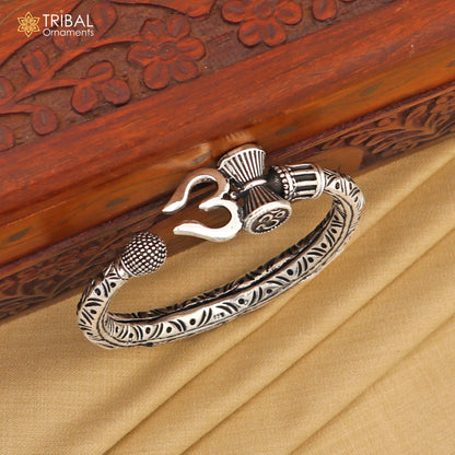 Sterling silver handmade Lord Shiva trident trishul bangle bracelet with chitai work, unisex design, customized tribal ornament.
