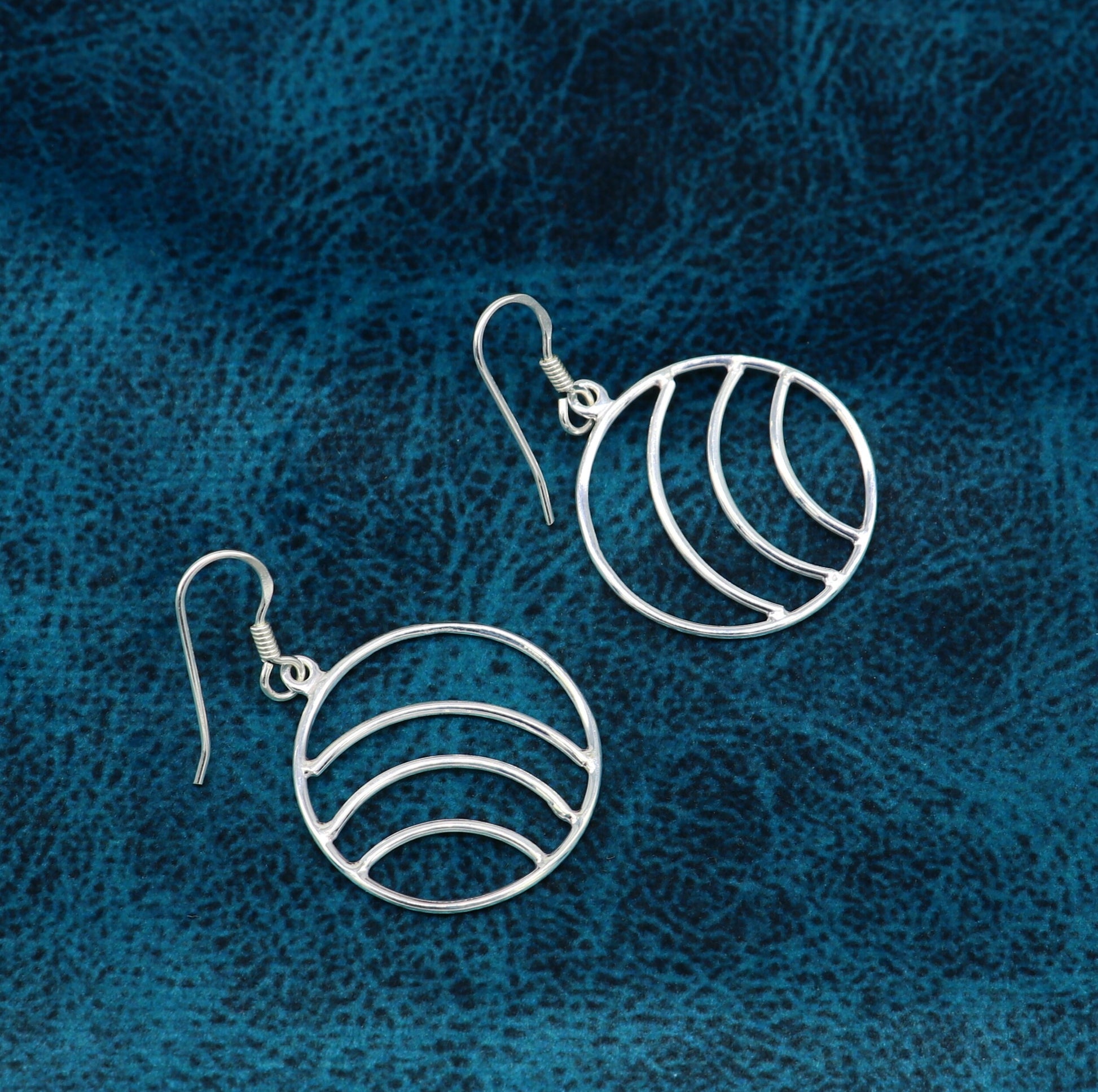 Sterling silver handmade circle hoop earrings with geometric drop design, elegant and trendy jewelry by TRIBAL ORNAMENTS.