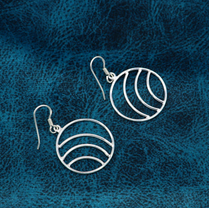 Sterling silver handmade circle hoop earrings with geometric drop design, elegant and trendy jewelry by TRIBAL ORNAMENTS.