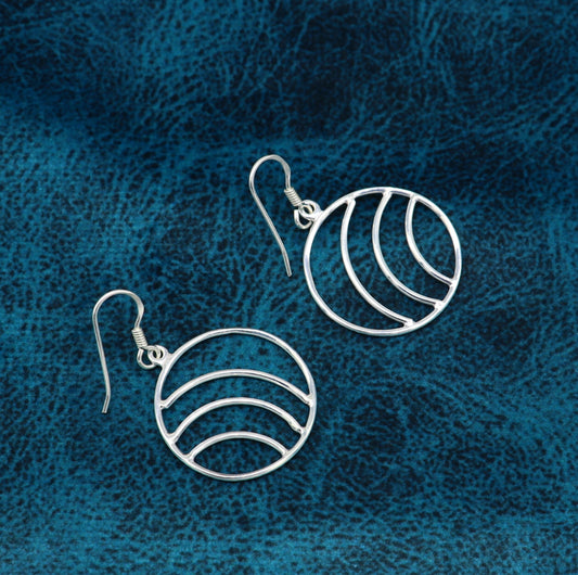 Sterling silver handmade circle hoop earrings with geometric drop design, elegant and trendy jewelry by TRIBAL ORNAMENTS.