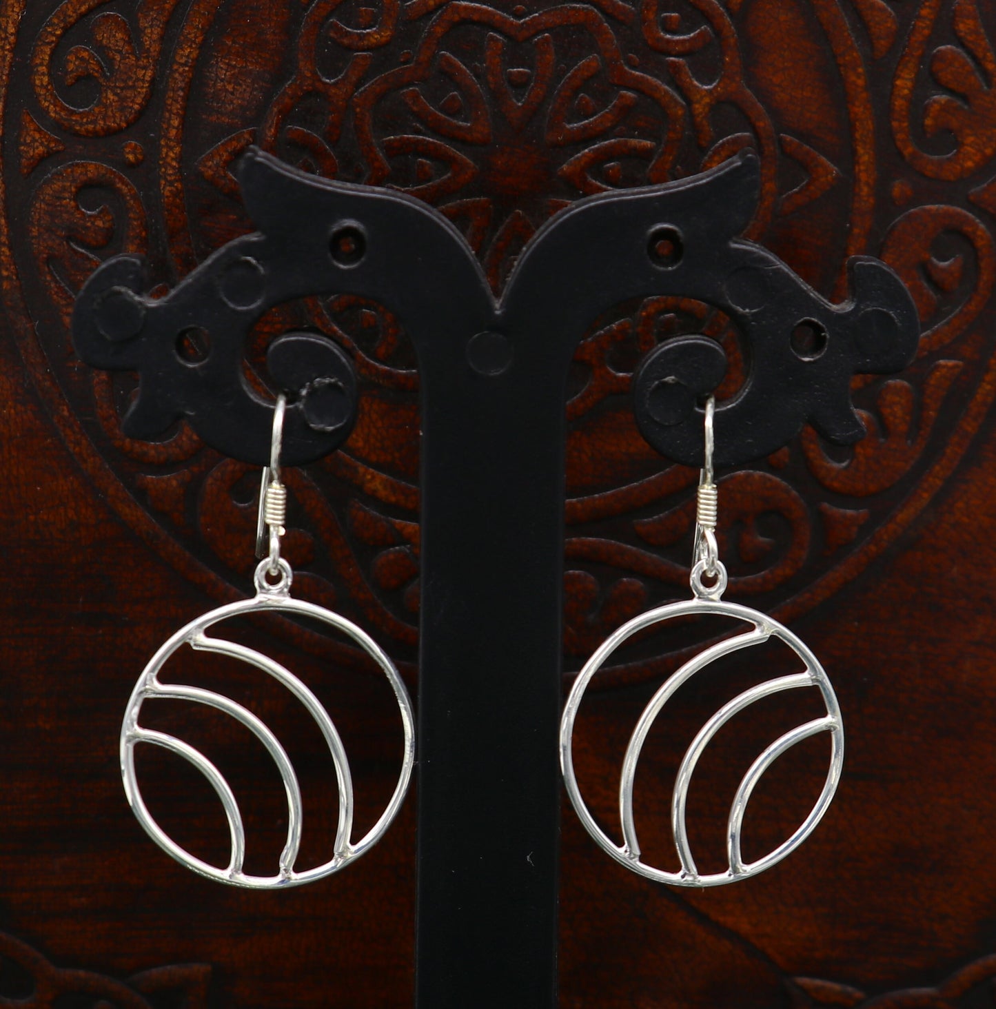 Sterling silver handmade circle hoop earring with drop dangle geometric style, elegant and trendy jewelry by Tribal Ornaments.