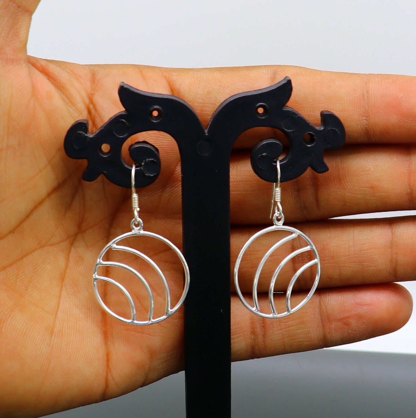 Sterling silver handmade circle hoop earring with geometric drop dangle design, stylish and elegant jewelry for women.