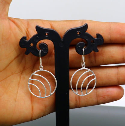 Sterling silver handmade circle hoop earring with geometric drop dangle design, stylish and elegant jewelry for women.