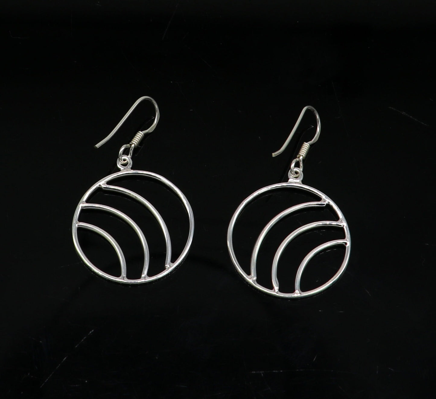 Sterling silver handmade circle hoop earring with geometric drop dangle, stylish and elegant jewelry by TRIBAL ORNAMENTS.