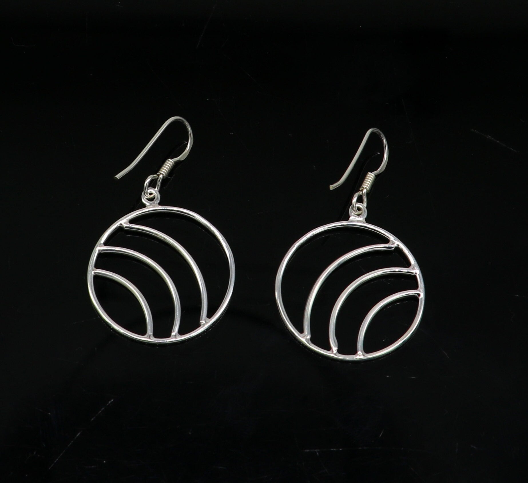 Sterling silver handmade circle hoop earring with geometric drop dangle, stylish and elegant jewelry by TRIBAL ORNAMENTS.