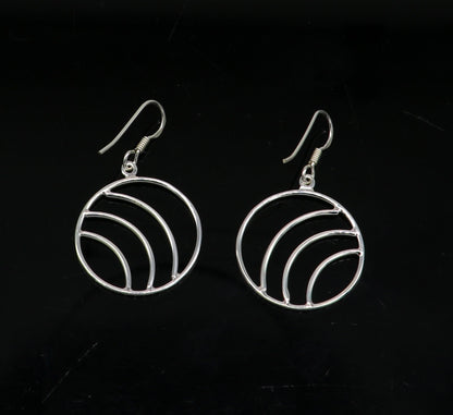 Sterling silver handmade circle hoop earring with geometric drop dangle, stylish and elegant jewelry by TRIBAL ORNAMENTS.