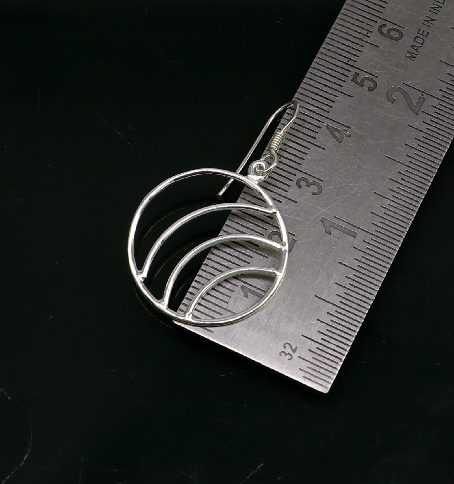 Sterling silver handmade circle hoop earring with geometric drop dangle design, elegant and trendy jewelry by TRIBAL ORNAMENTS