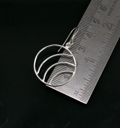 Sterling silver handmade circle hoop earring with geometric drop dangle design, elegant and trendy jewelry by TRIBAL ORNAMENTS