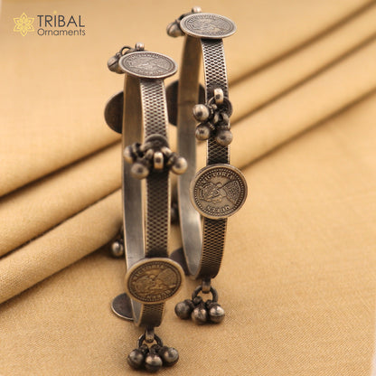 Sterling silver tribal ethnic bangle bracelet with vintage style hanging drops, handcrafted by TRIBAL ORNAMENTS for gifting.