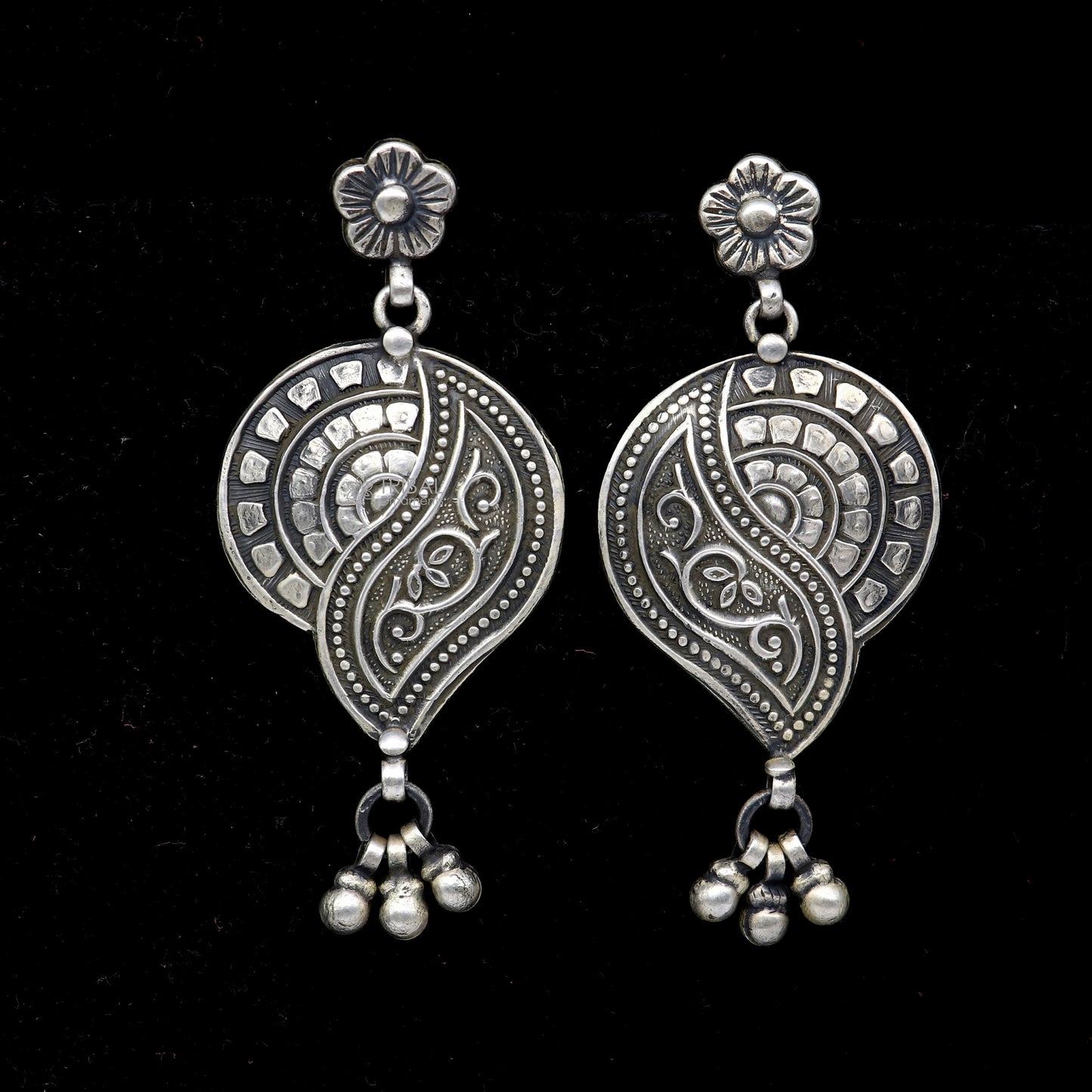 Sterling silver floral drop dangle earring by TRIBAL ORNAMENTS, handmade vintage jewelry with intricate floral design.
