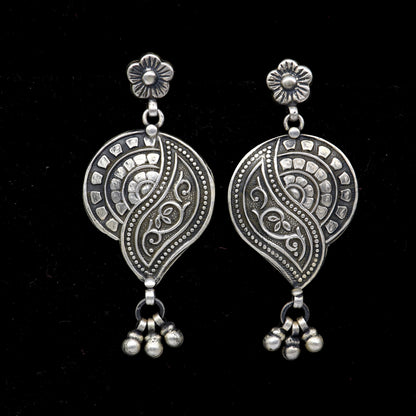 Sterling silver floral drop dangle earring by TRIBAL ORNAMENTS, handmade vintage jewelry with intricate floral design.