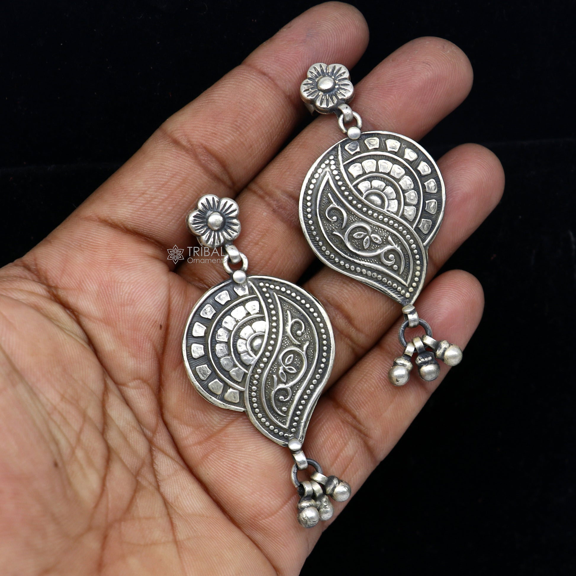 Sterling silver floral drop dangle earring by TRIBAL ORNAMENTS, handcrafted vintage jewelry with intricate floral design and stylish appeal.