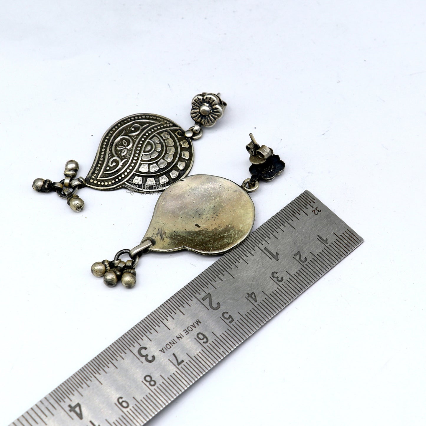 Sterling silver floral drop dangle earring by TRIBAL ORNAMENTS, handmade vintage jewelry with intricate floral design and stylish appeal.