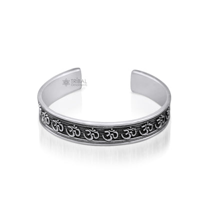 Unisex 925 sterling silver "AUM" Mantra cuff bangle bracelet with oxidized finish, adjustable handmade jewelry by Tribal Ornaments.