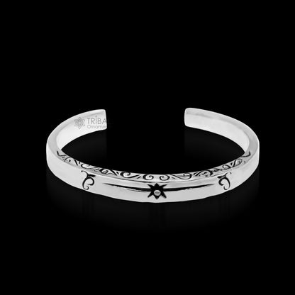 Sterling silver vintage-style cuff bracelet by TRIBAL ORNAMENTS, unisex stylish jewelry with intricate handmade design.